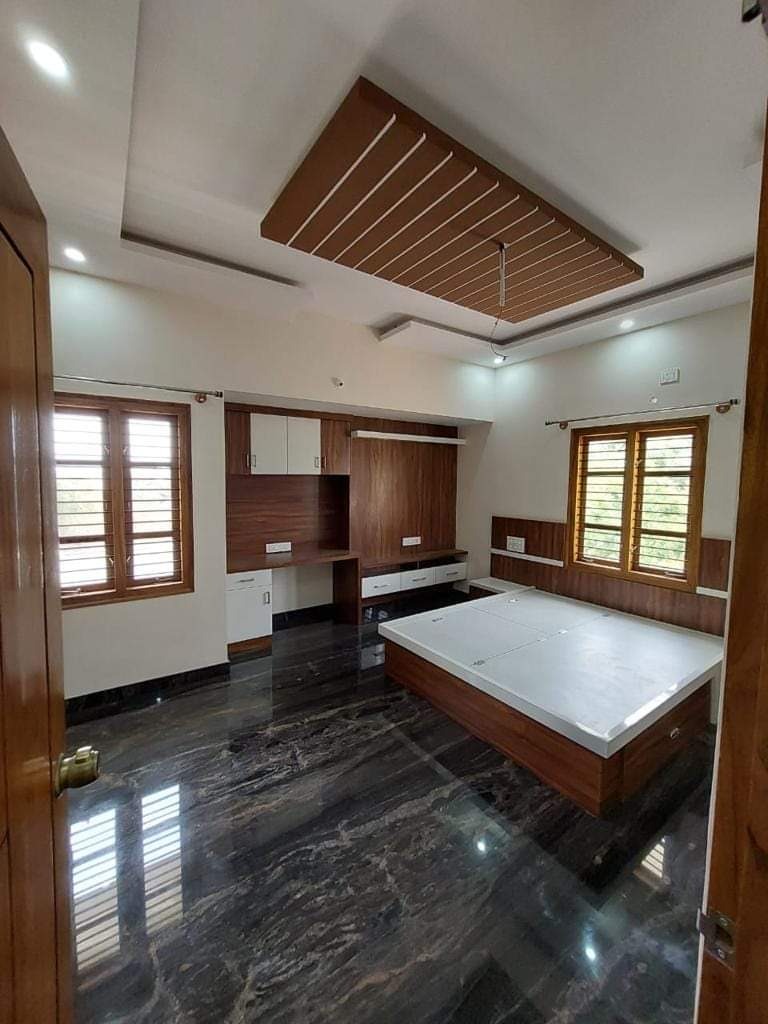 Finished bedroom with granite flooring
